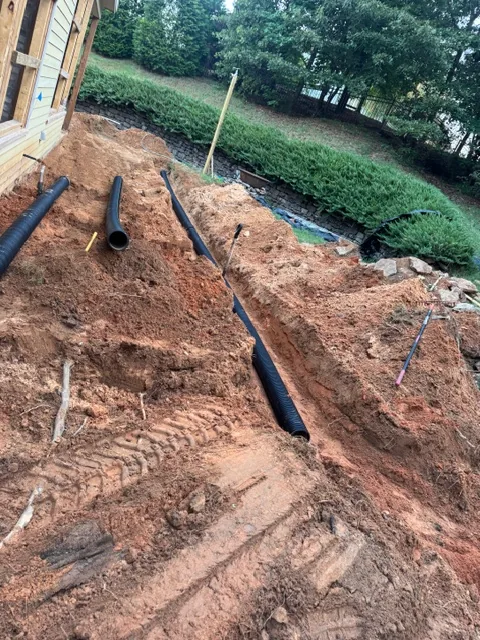 Jeremy Miller installing an irrigation system in Oxford, MS